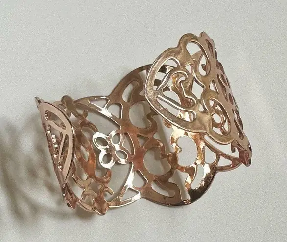 Lia Sophia gold tone cut out open cuff bracelet