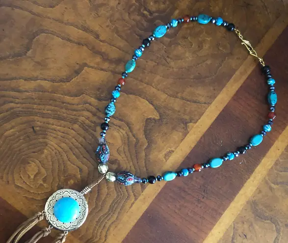 Handcrafted southwest style natural stone leather fringe medallion necklace