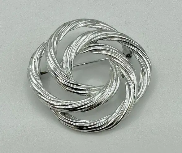 Vintage silver tone twisted knot Brooch