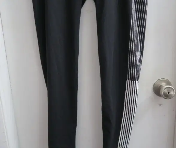 Victoria's Secret VSX sport knockout tight leggings in black, white and pink size medium.