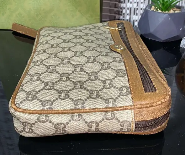 Gucci Authentic  GG Plus Clutch Bag