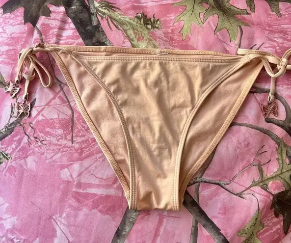 vintage tan orange bikini bottoms with gold butterfly charms