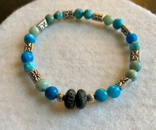 Fun handmade stretch blue beaded bracelet silver separaters lava beads