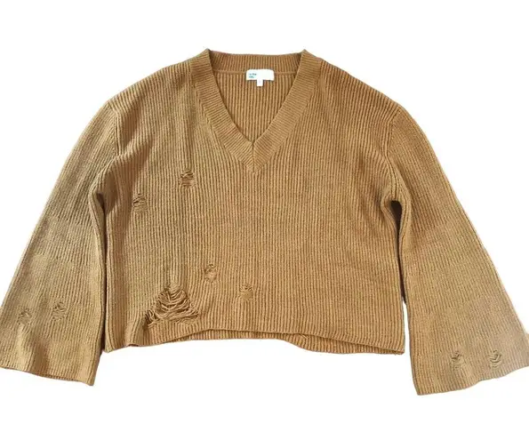 by the way. Revolve Mira Distressed Sweater Rust Mustard Gold