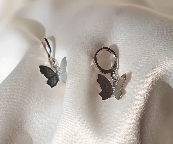 Boutique Silver Butterfly Huggie Earrings 