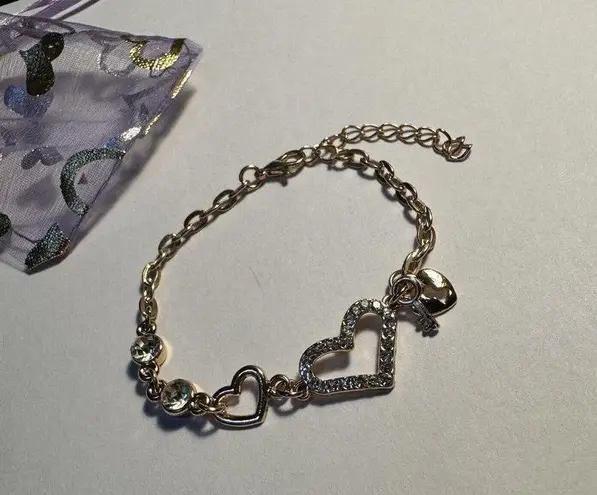NWOT Gold Tone Clear Rhinestone Heart Tennis Bracelet Adjustable 6 3/4