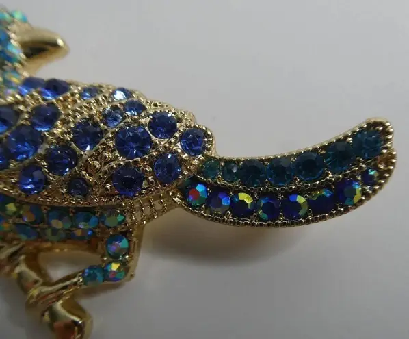 Monet  Signed Bird on Branch Brooch Pin Gold Tone Rhinestones Sparkly Iridescent