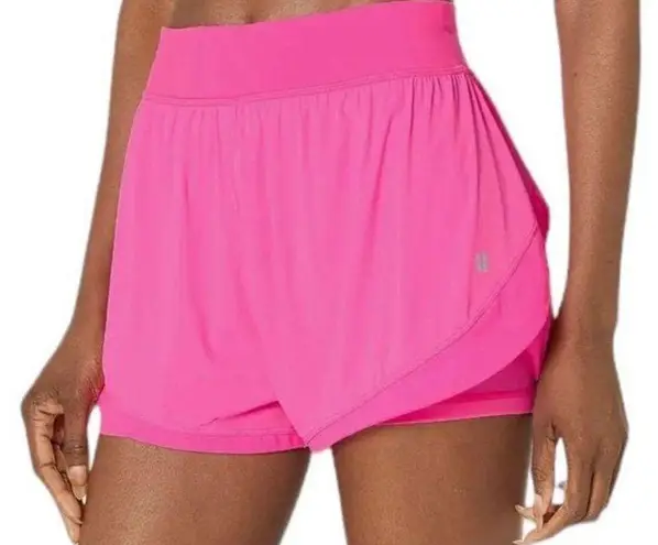 Sweaty Betty  Neon/ sonic pink athletic shorts.  Size small