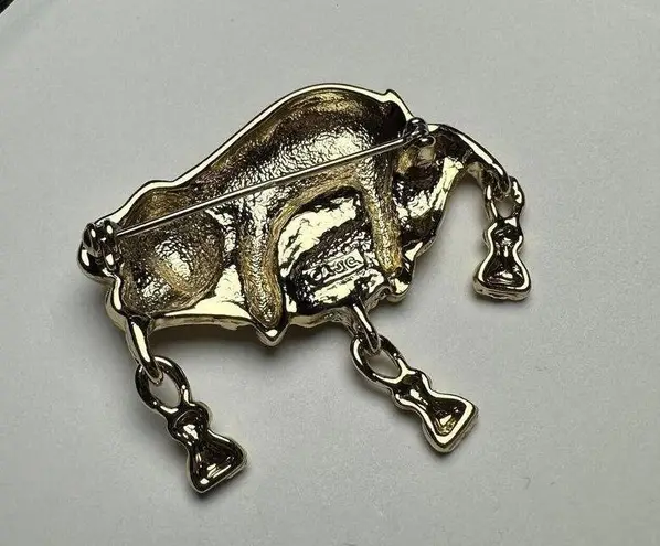 Signed AJC Gold Tone Pig On Tasseled Pillow Brooch Pin