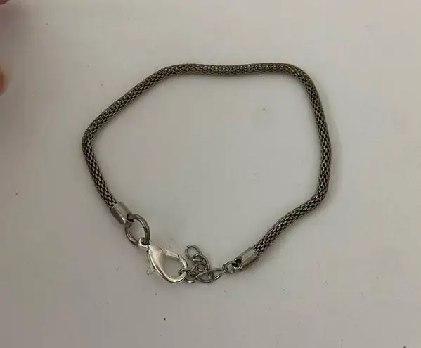 Boutique Repaired chain bracelet silver tone