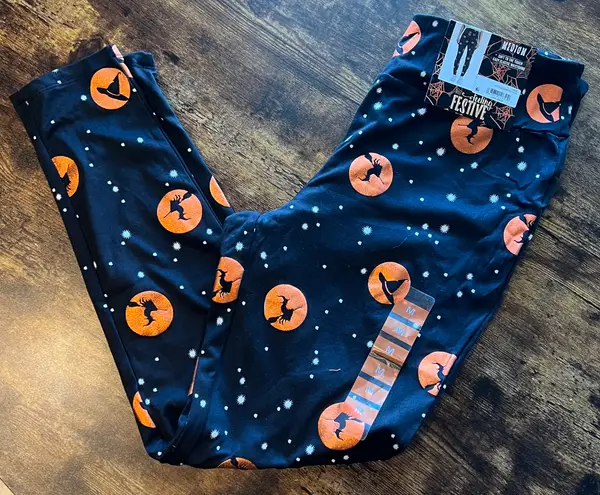 Feeling Festive | ladies jet black witch hats Halloween leggings. Size: M