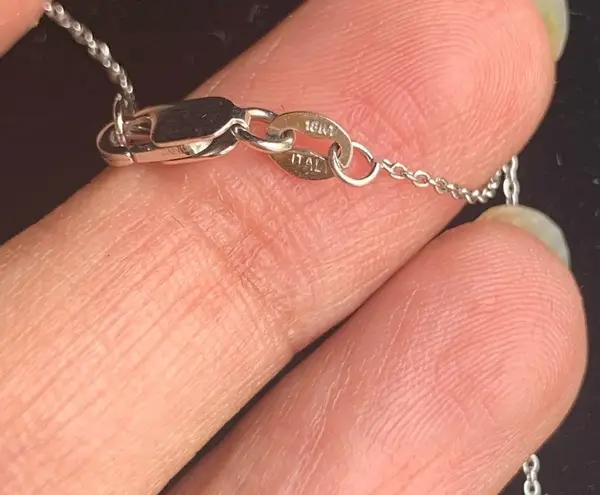 18k white gold chain with 14k gold solitaire charm