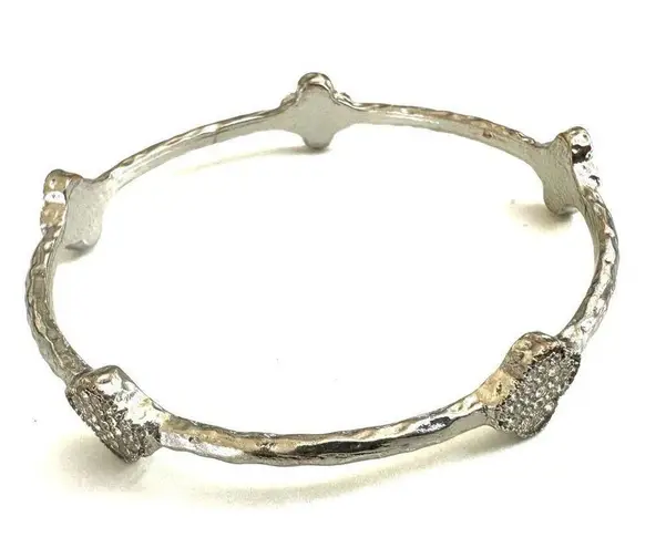 Silver tone clover bangle bracelet