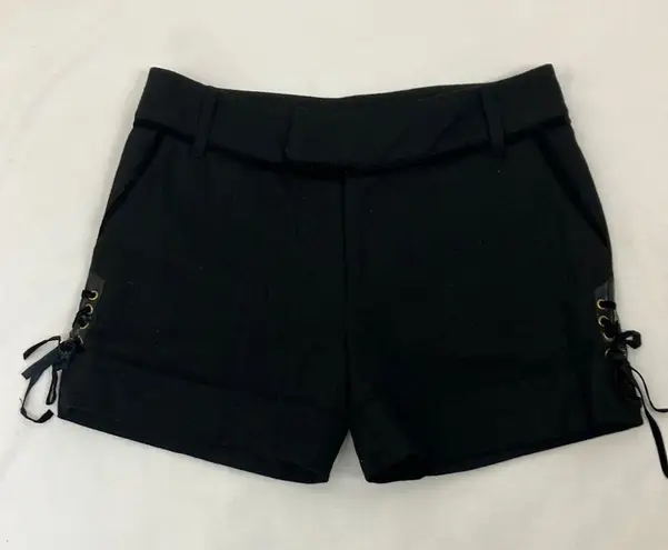 Image black cuffed mini shorts with lace up details woman’s size small