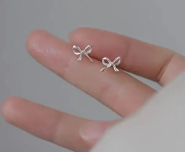 Boutique Silver Bow Stud Earrings