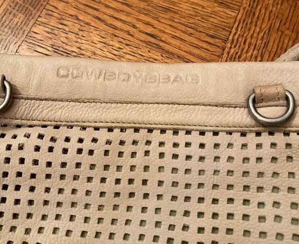 COWBOYS BAG LASER CUT LEATHER CLUTCH