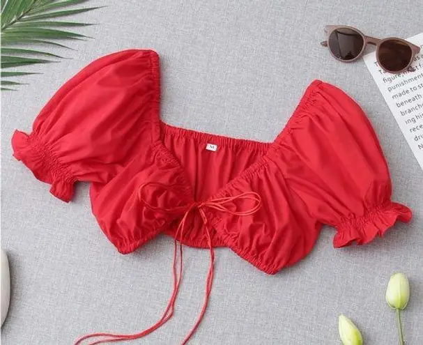 NWOT red cropped top with front tie and ruffle puff sleeve size small