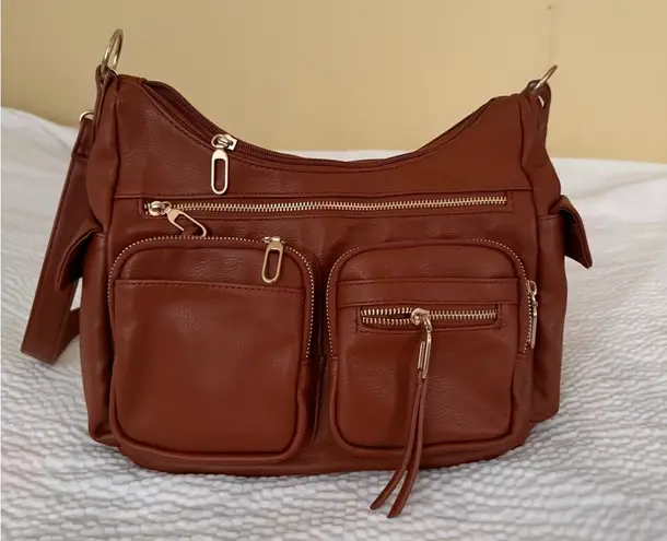 Brown Leather Shoulder Bag with Slouchy Design and Gold Hardware