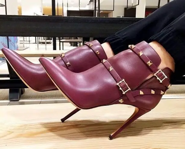 Valentino Garavani Valentino Rockstud pointy toe harness ankle boot in wine calfskin leather IT 36