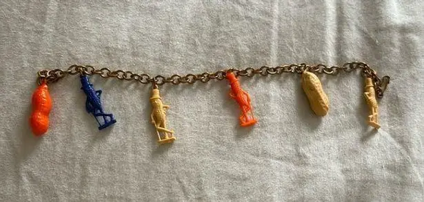 Vintage Advertising PLANTERS MR PEANUT Figural Plastic Charm Bracelet 7” Long Orange