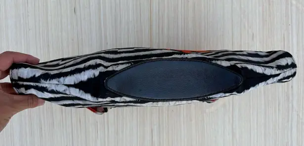 Alexander McQueen De Manta feather print clutch bag in black white bright red