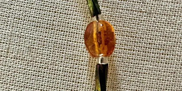 Green open circle beaded pendant necklace