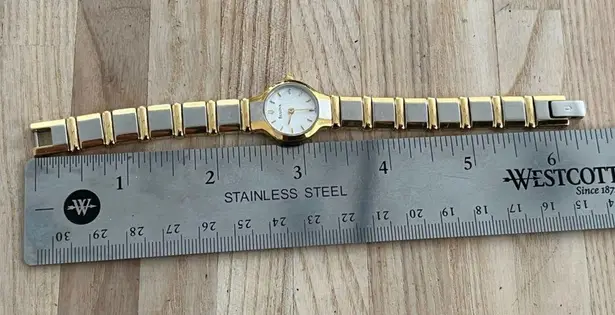 Bulova Ladies Watch Two Tone Bracelet White Sparkly Dial Gold Tone Hands Markers