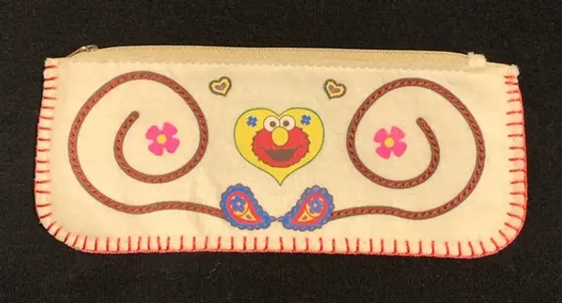 Sesame Street Sanrio x Elmo pouch NWOT