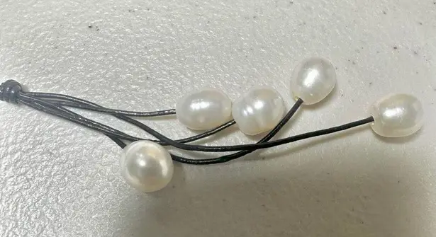 Pearl pendant necklace on cord