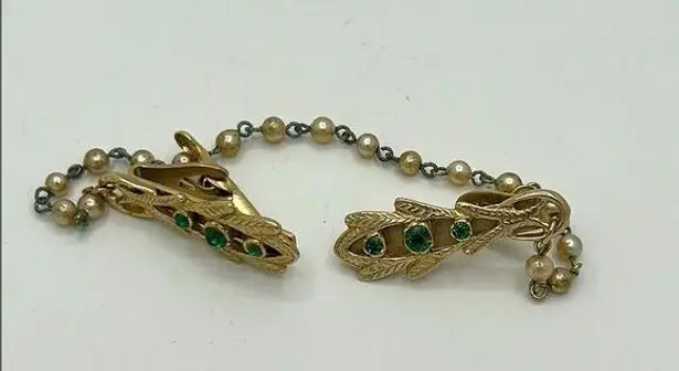 Vintage gold tone sweater clip