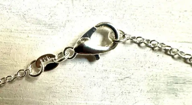 Black silver tone rhinestone pendant necklace