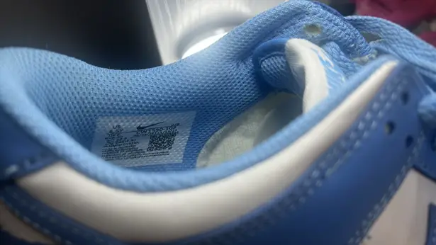 Nike Selling blue and white  dunks they are barely used. No creases in them very fairly new 