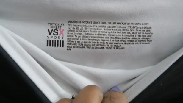 Victoria's Secret VSX sport knockout tight leggings in black, white and pink size medium.