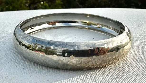 Silver tone hammered bangle bracelet