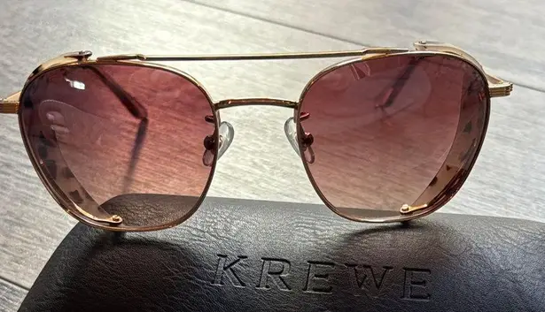 Krewe Sunglasses with Gold Frame and Pink Lenses