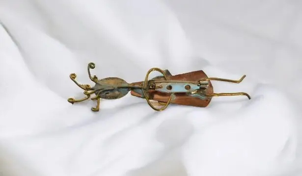 Vintage Copper Brooch With Unique Heart and Star Patterns Orange