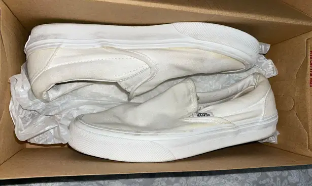 Vans White Slip-ons