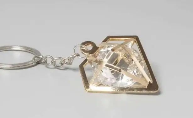 Gold Geometric Keychain with Caged “Diamond”