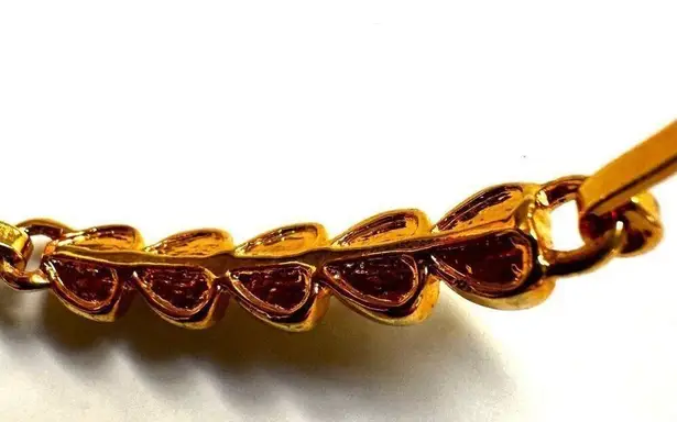 Gold tone heart rhinestone bangle bracelet