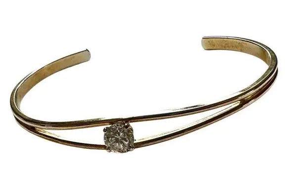 Gold tone open cuff rhinestone bracelet