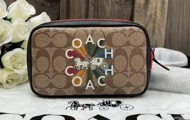 Coach CARRIER PHONE CROSSBODY IN SIGNATURE CANVAS WITH  RADIAL RAINBOW c6… thumbnail 1