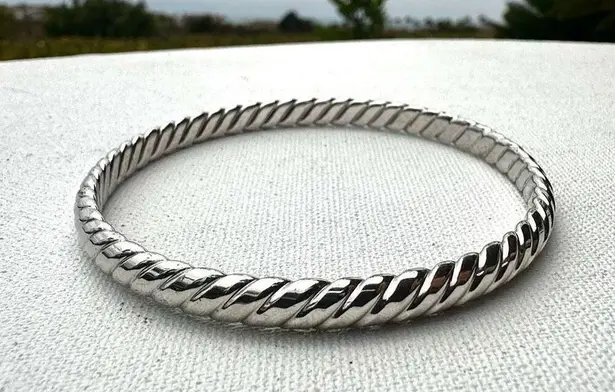 Silver tone twisted bangle bracelet