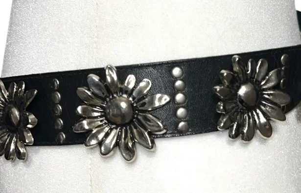 Cute black belt with silver studded detailing, cute silver metal flowers too