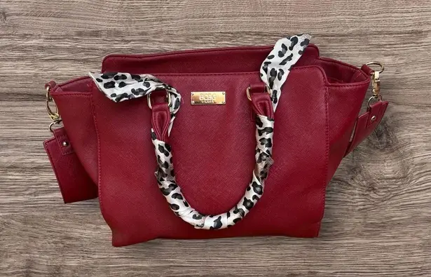 BCBG Paris Satchel Handbag with scarf wrapped strap handles. Red