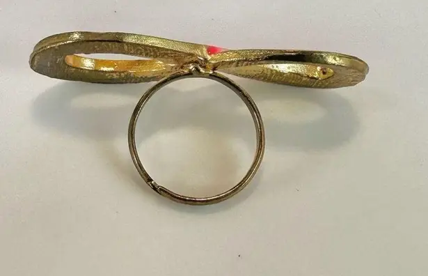 Pink and gold tone infinity ring