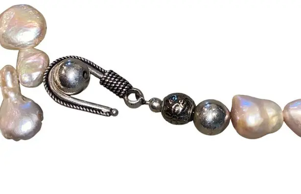Keshi pearl & sacred OM mandala w/ unique charms along the string of pearls