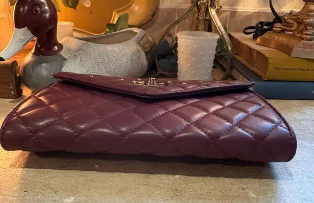 Badgley Mischka Purple Crossbody Bag with Gold Hardware and Quilted Design