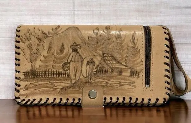 Handmade Tooled El Salvador wallet has lots of storage and inside mirror. Tan