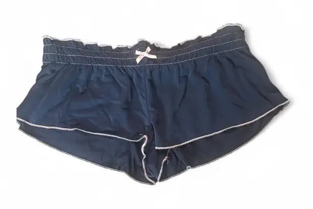 Edikted Alice Gathered navy Blue Shorts with Pink Trim. Side small.