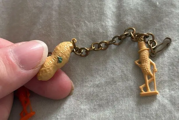Vintage Advertising PLANTERS MR PEANUT Figural Plastic Charm Bracelet 7” Long Orange